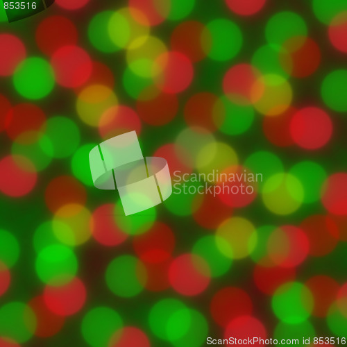 Image of Festive red and green lights in a blurred background