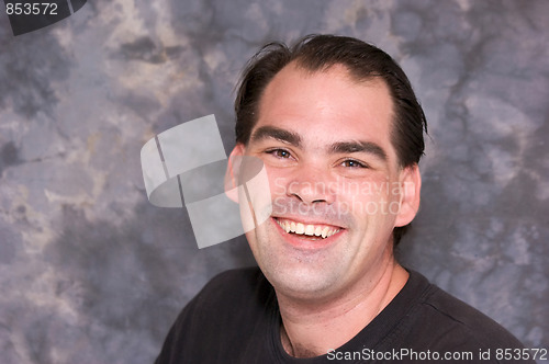 Image of average man laughing
