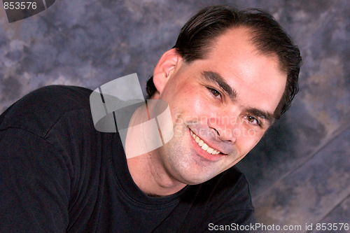 Image of smiling man in tshirt