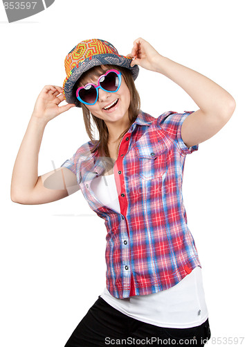 Image of Beautiful girl smiles in sunglasseses and colour hat