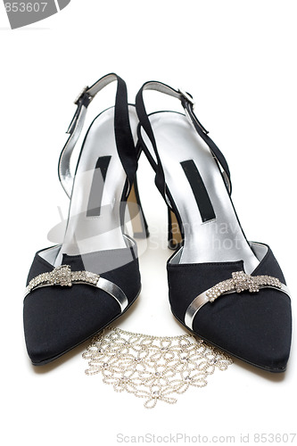 Image of Feminine black loafers and necklace