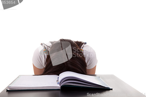 Image of woman has stress because of  work on her desk