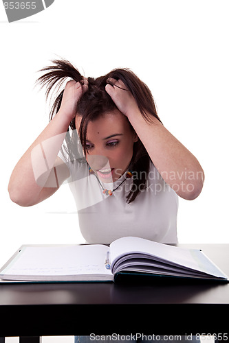 Image of woman has stress because of  work on her desk