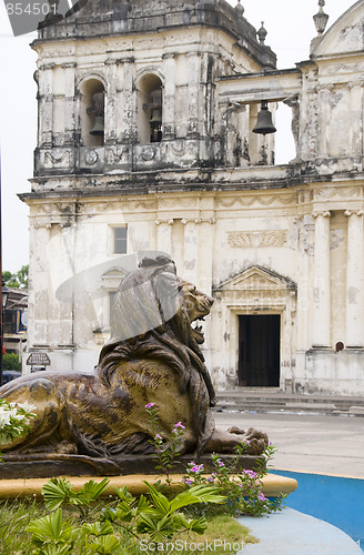 Image of lion statue fountain in front of basilica cathedral of asuncion 