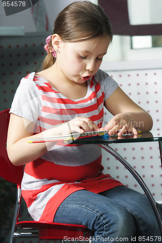 Image of Girl reading book aloud