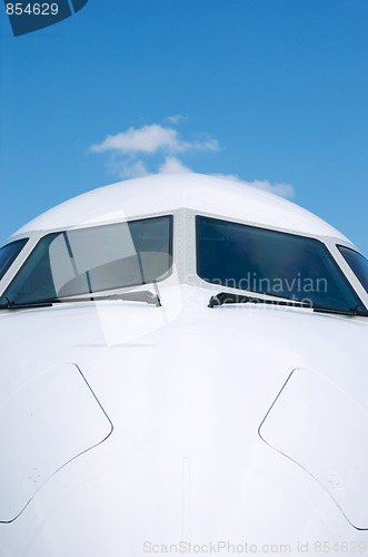 Image of Front detail of white airplane