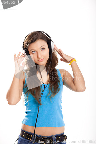 Image of Young girl listen music