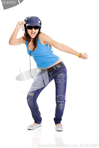 Image of Young girl listen music