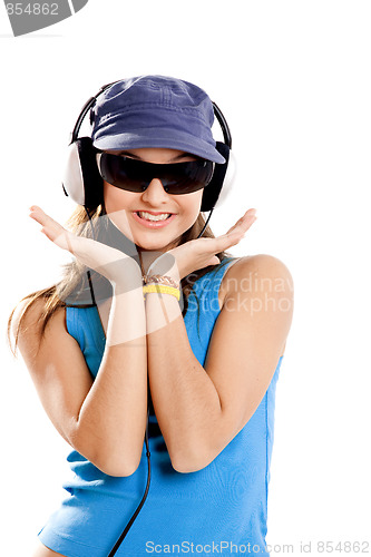 Image of Young girl listen music
