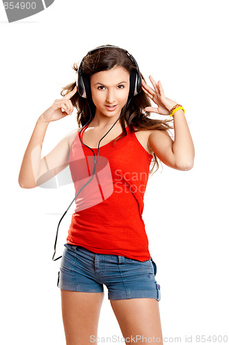 Image of Young girl listen music