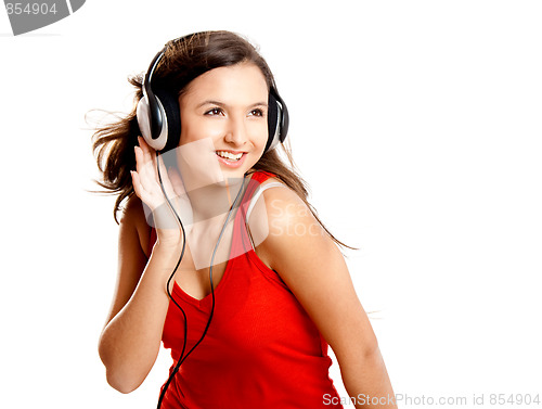 Image of Young girl listen music