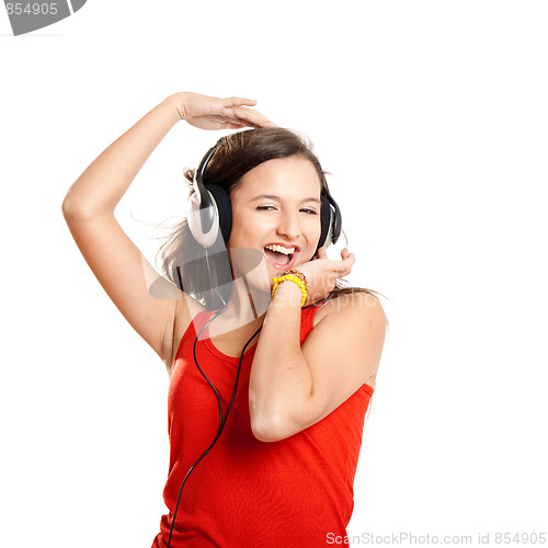 Image of Young girl listen music