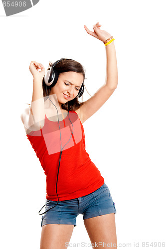 Image of Young girl listen music