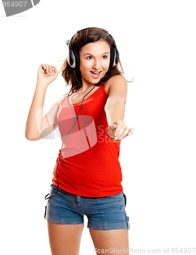 Image of Young girl listen music