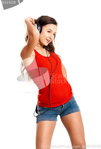 Image of Young girl listen music