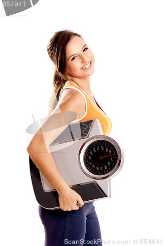 Image of Athletic girl with a scale