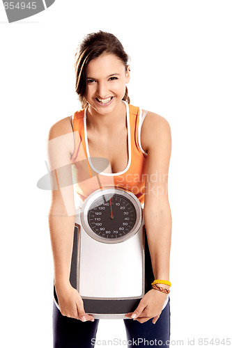 Image of Athletic girl with a scale