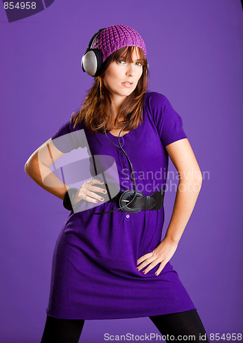 Image of Beautiful woman listening music