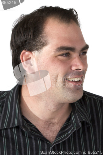 Image of smiling man looking to side