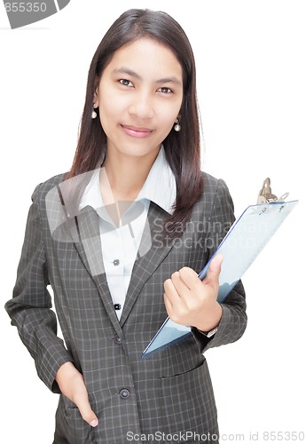 Image of Confident Asian businesswoman w clipboard