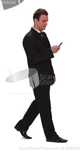 Image of Businessman checking the mobile phone
