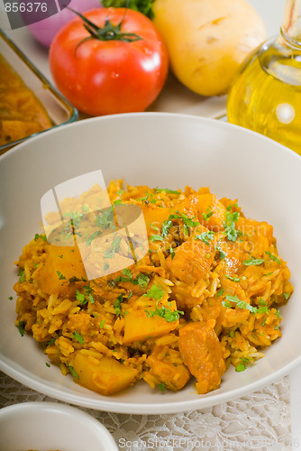 Image of curry beef rice and potatoes