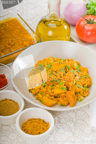 Image of curry beef rice and potatoes