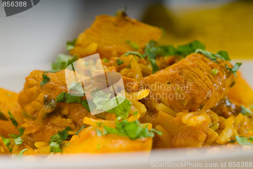 Image of curry beef rice and potatoes