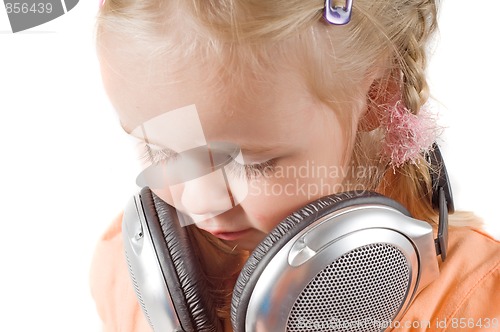Image of Little girl with headphones