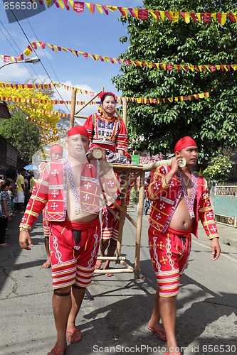 Image of Tribal parade w sedan chair Philippines