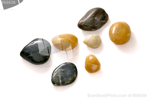 Image of polished stones on white