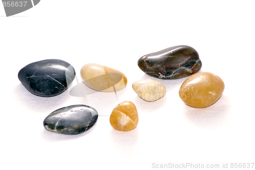 Image of smooth stones on white