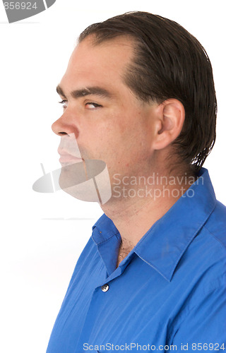 Image of man looking out corner of eye