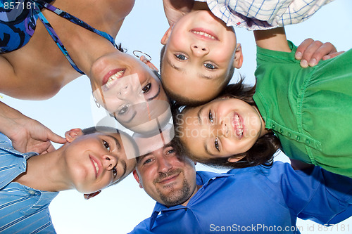 Image of Happy Family Huddle