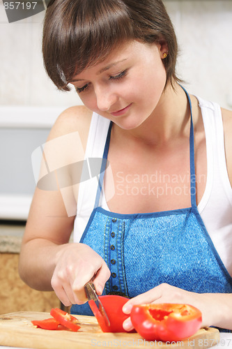 Image of Woman cutting paprika