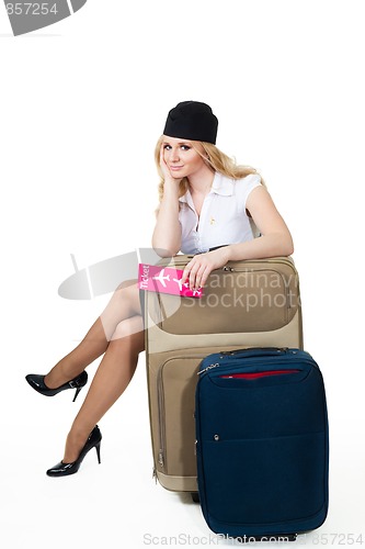 Image of Flight attendant with baggage