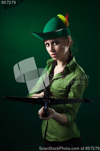 Image of Serious woman with crossbow