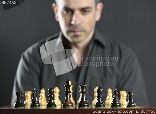 Image of Man at chess board