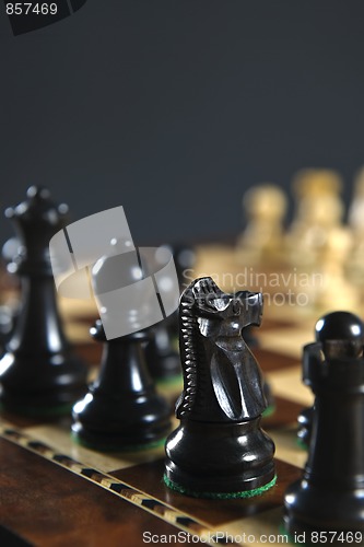 Image of Black chess pieces on board