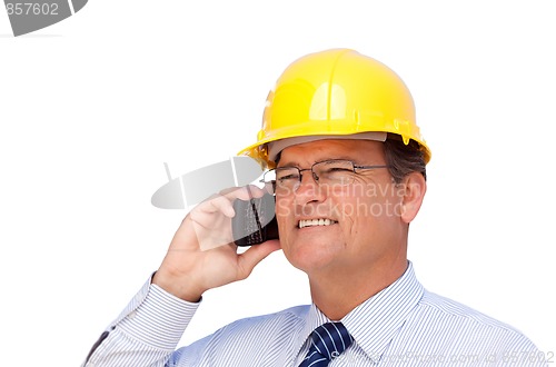 Image of Contractor in Hardhat on His Cell Phone Isolated