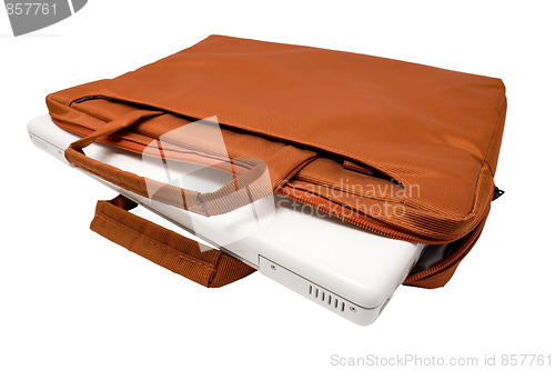 Image of Orange bag and white laptop