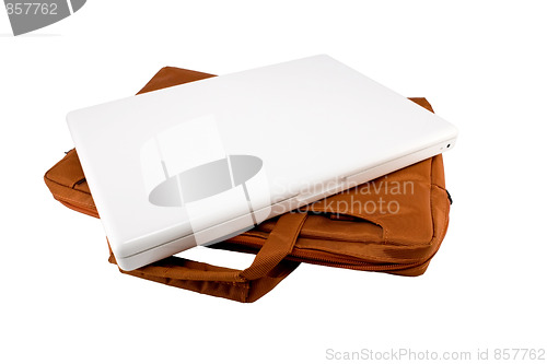 Image of Orange bag and white laptop