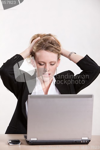 Image of Attractive thirties caucasian blonde businesswoman