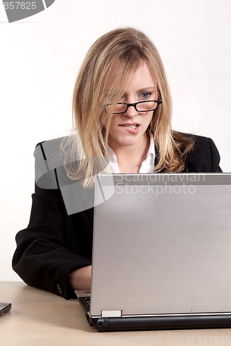 Image of Attractive thirties caucasian blonde businesswoman