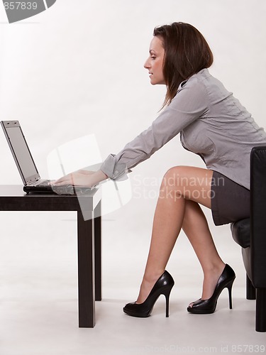 Image of Attractive brunette caucasian businesswoman