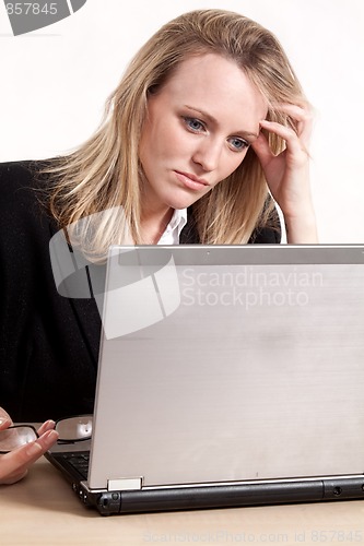 Image of Attractive thirties caucasian blonde businesswoman