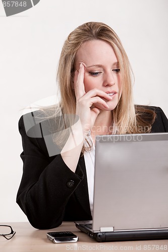 Image of Attractive thirties caucasian blonde businesswoman