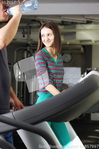 Image of Smiling woman on treadmill