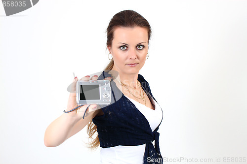 Image of The attractive woman show YOUR photo on digital camera