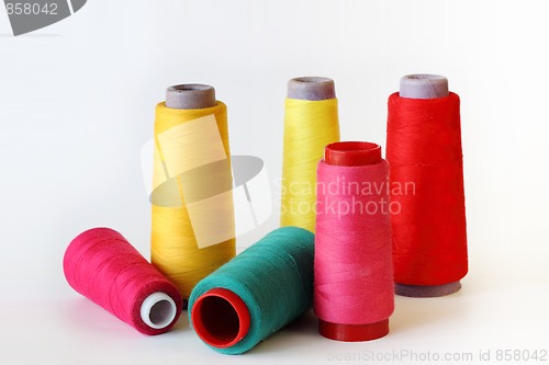 Image of colored thread to sew on white 